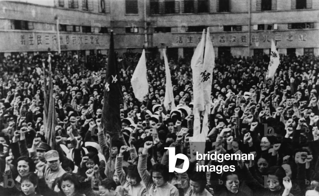 Chinese women cheering Madame Chiang Kai Shek's speech during Women's Day celebrations. Chongqing (Chungking), China, June 1942. Second Sino-Japanese War/World War 2