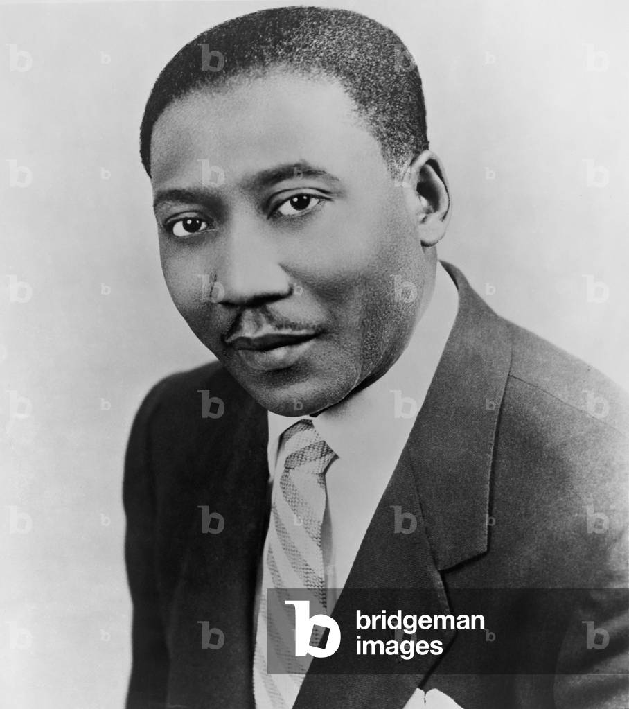 Muddy Waters (1915-1983), blues guitarist and singer emerged from the Mississippi Delta in the 1940s. In Chicago he pioneered in using the electric guitar in his blues performances. 1964