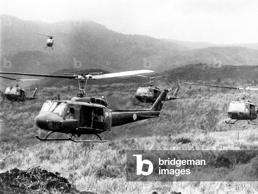 Vietnam War, American helicopters leaving staging area of Khe Sanh to carry South Vietnamese paratroopers to advance positions in Laos, 02/12/71