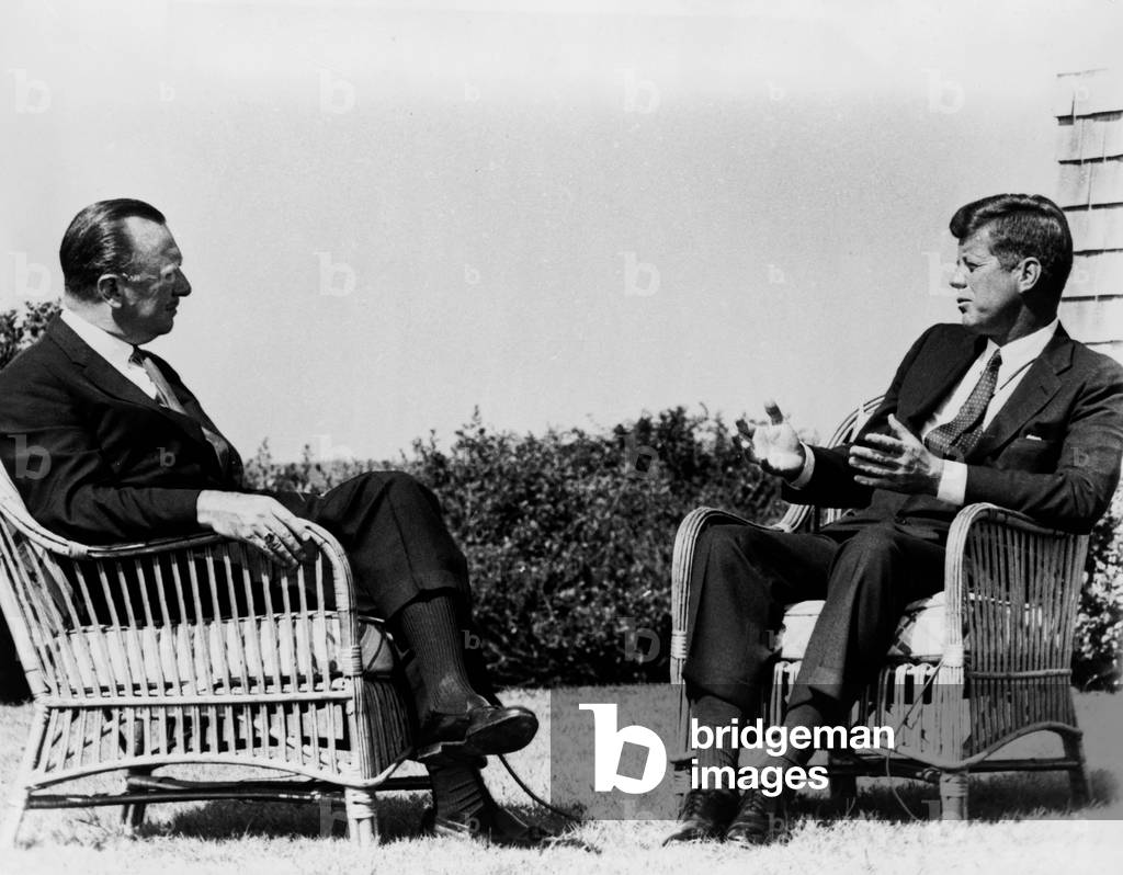 President John Kennedy is interviewed by newsman Walter Cronkite outside the president's Hyannis Port home. Sept. 2, 1963