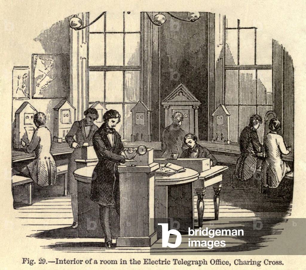 Interior room of the Electric Telegraph Office at Charing Cross, London. British telegraph equipment was based on the Cooke-Wheatstone patent, the clock-like devices along the walls, in which the receiver pointed to the letters on a dial, which spared operators the task of translating code