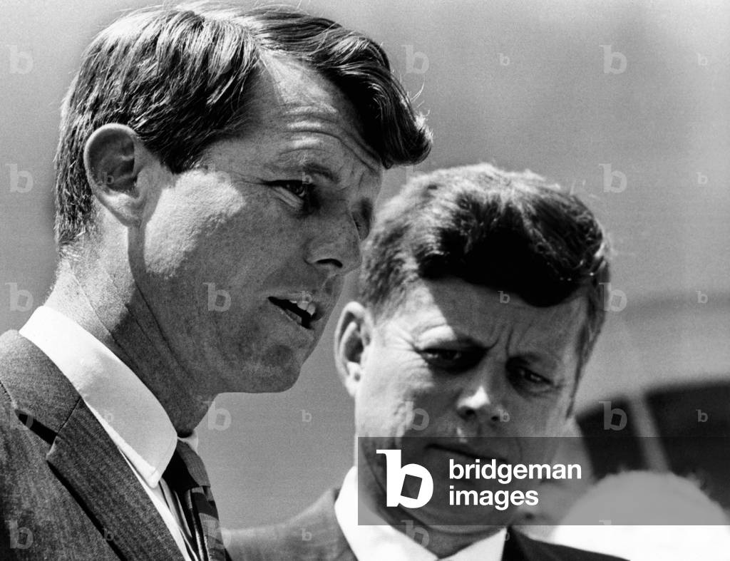 President John Kennedy and Attorney General Robert Kennedy during ceremonies honoring the bravery of young African Americans. A few days earlier, black school children were jailed for protesting against racial discrimination at Birmingham, Alabama's city hall. May 7, 1963