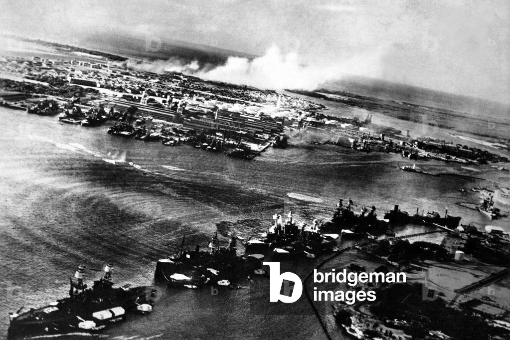Japanese photograph taken during the attack on Pearl Harbor, Dec. 7, 1941. In the distance, the smoke rises from Hickam Field