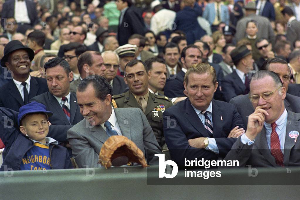 President Richard Nixon enjoys opening day at RFK Stadium, April 7, 1969. Senators owner Bob Short is second from right. Commissioner of Baseball Bowie Kuhn is on far right