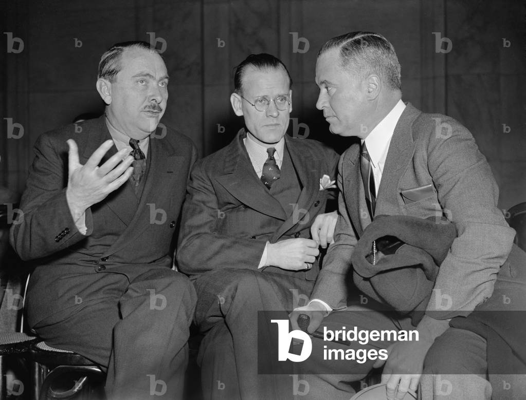 American television inventor, Philo T. Farnsworth testified to a Congressional committee about the difficulties in getting patents. Farnsworth is seated between George Everson, Secretary of Farnsworth Television, Inc. and Richard C. Patterson, Jr., Assistant Secretary of Commerce. January 1939