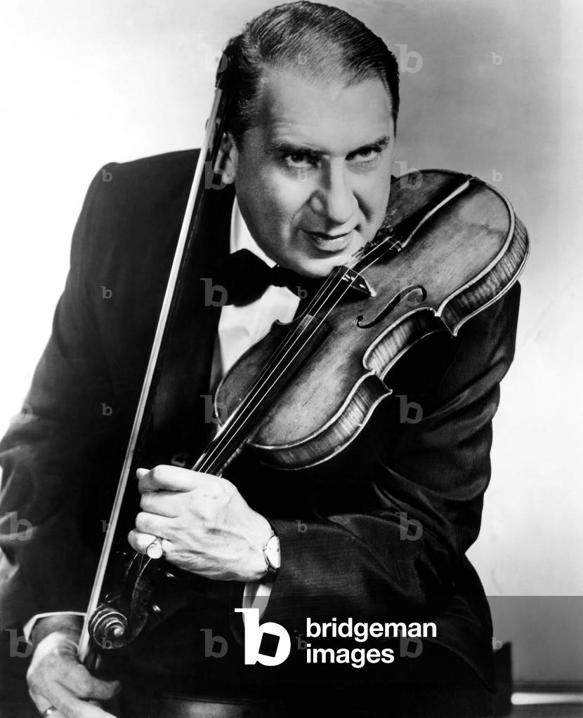 Henny Youngman, (1906-1998), violinist and comedian, 1962.