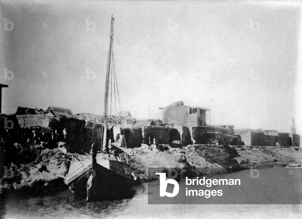 Iraq, A small sail boat anchored on the shore of the Tigris River near Kut-El-Amara, c.1920s