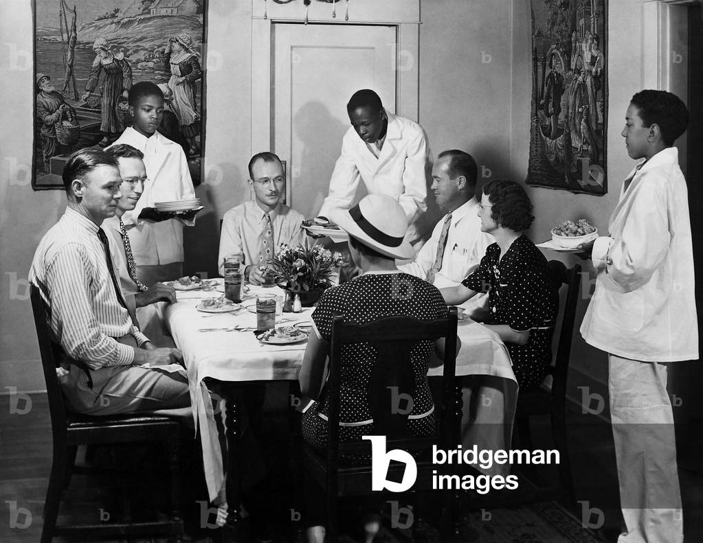 African American youths in a WPA training program, c. 1937. They serving a meal to WPA staff at a National Youth Administration center in Arizona