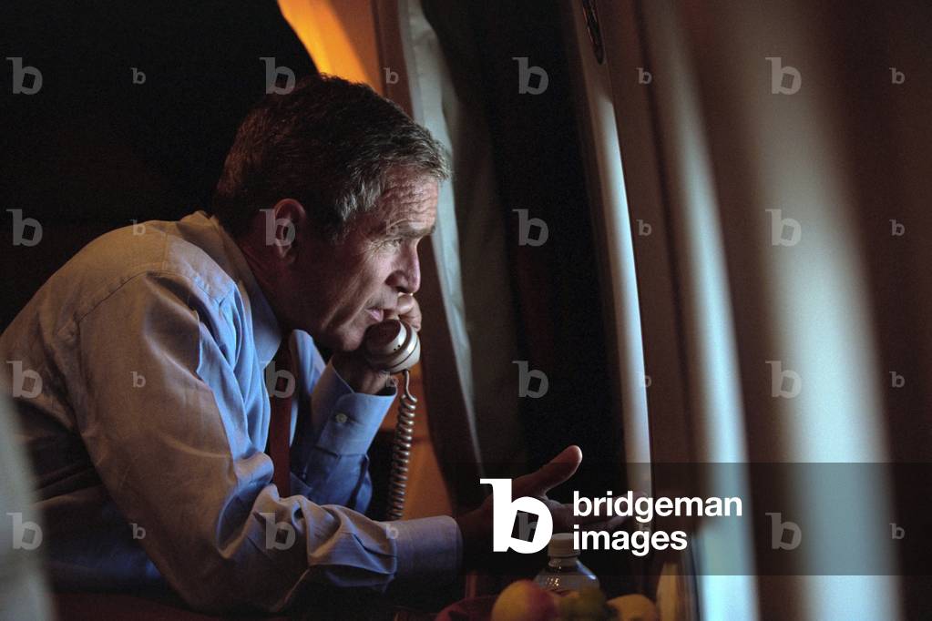 President George W. Bush on the phone with Vice President Dick Cheney from Air Force One. Sept. 11, 2001. Bush's plane left Offutt Air Force Base at 4:36 PM, arriving at the White House at 6:54 PM