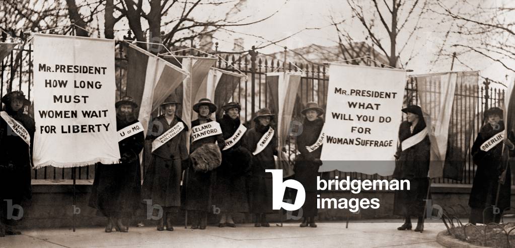 National Women's Party demonstration by college women in front of the White House in 1918. The banner protests Wilson's failure to support women's suffrage