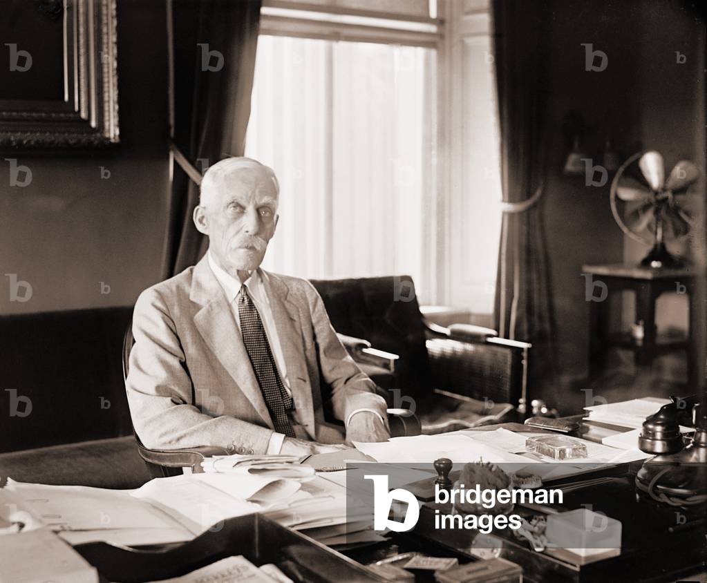 Andrew Mellon (1855-1937), Secretary of the Treasury from 1921-1932. His pro-business policies were later characterized as trickle down economics. Dec. 4, 1925 portrait in his office