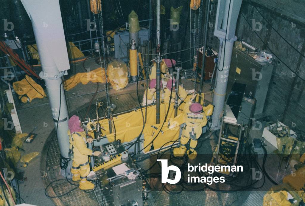 Nuclear engineers inside Unit 2 of the Three Mile Island Nuclear Generating Station wearing protective clothing after the partial meltdown of the reactor. April 1979