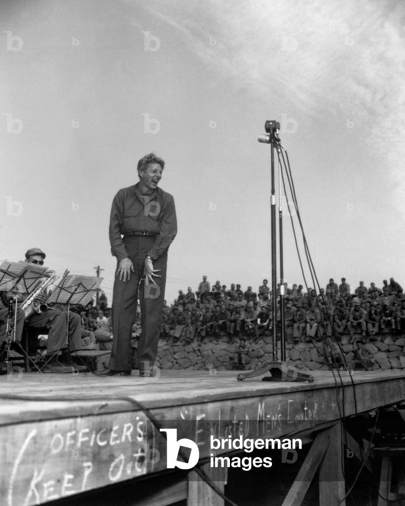Danny Kaye, entertains 4,000 occupation troops of the 5th Marine Division at Sasebo, Japan. Oct. 25, 1945