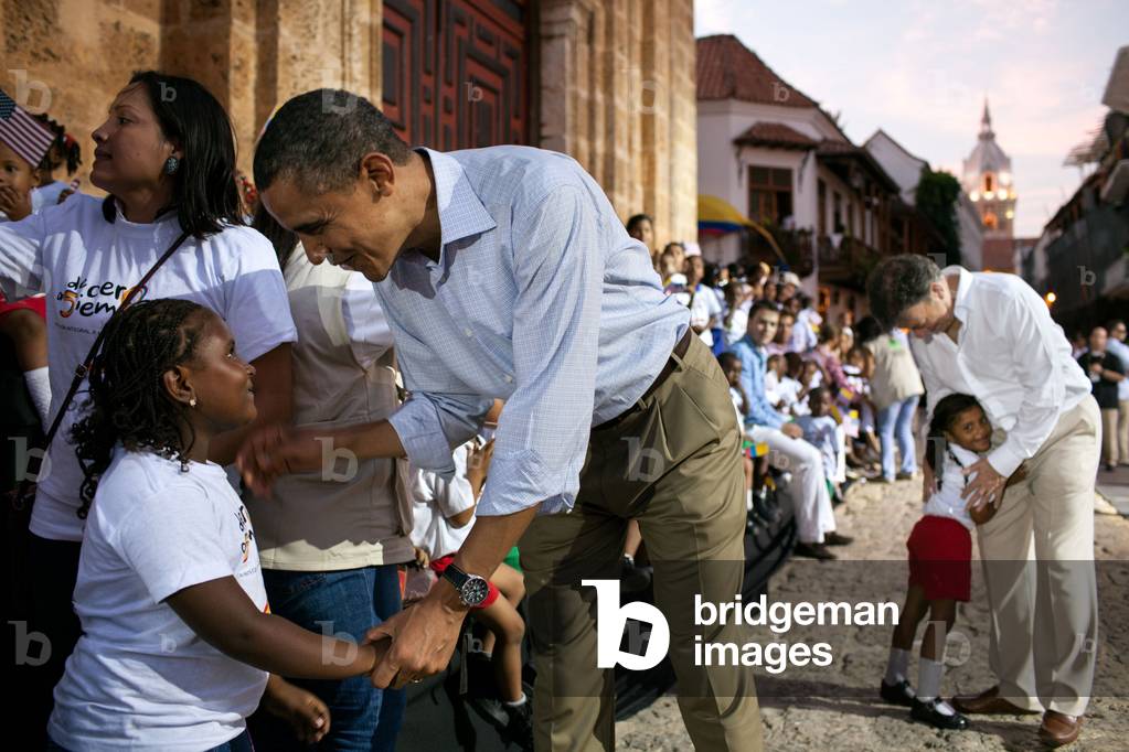 President Barack Obama after a Land Titling event at the Plaza de San Pedro, Cartagena, Colombia. Families were given titles to land they farmed for decades. President Juan Manuel Santos of Colombia is at right. April 15, 2012