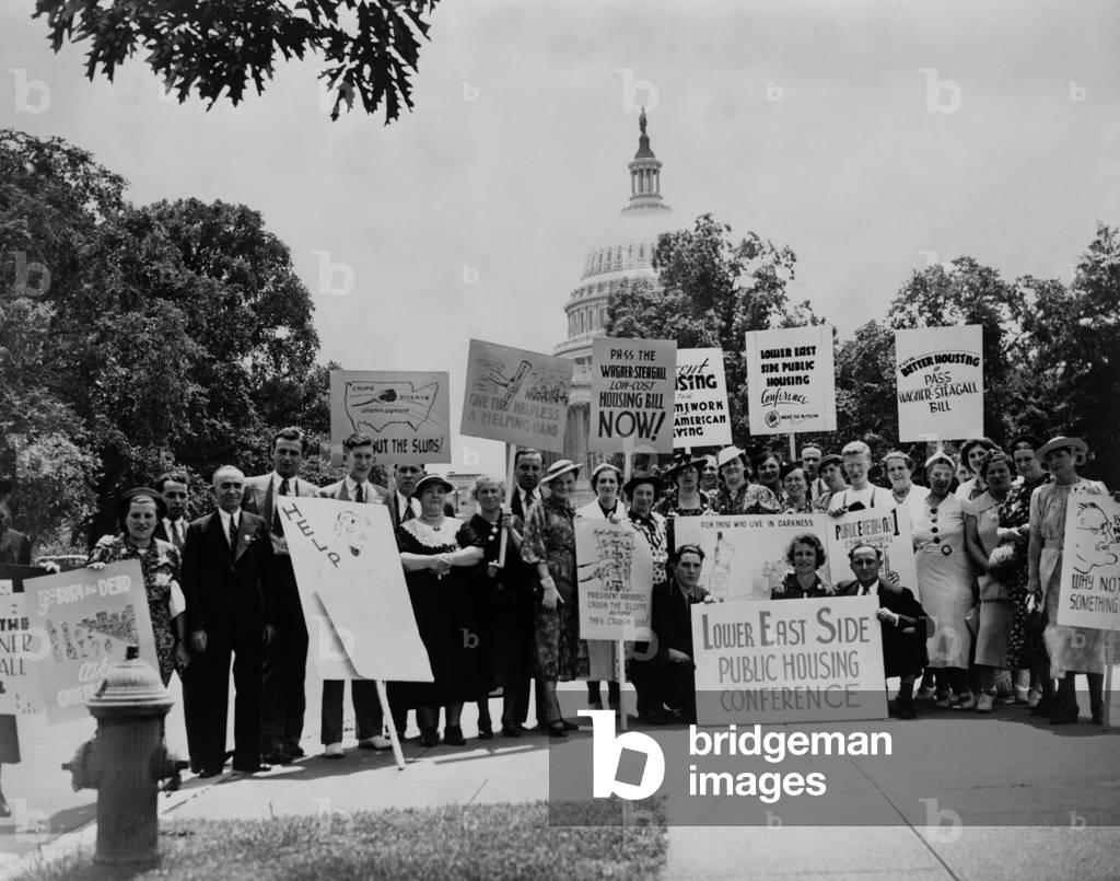 New Yorkers protest for passage of the Wagner-Steagall Housing Act, 1937. The act was passed to replace derelict housing with safe dwellings for low-income families on Sept. 1, 1937