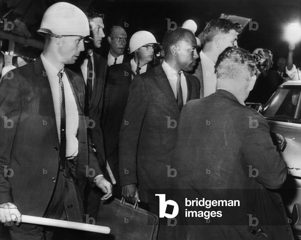US Civil Rights. Right center: James H. Meredith, being escorted by federal marshals upon arriving a