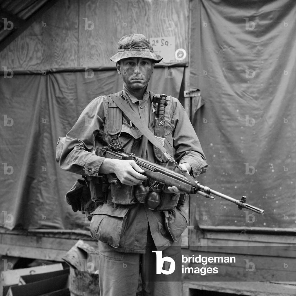 Vietnam War. US Marine Sergeant prepared to go into a field with a Reconnaissance Battalion. April 10, 1967