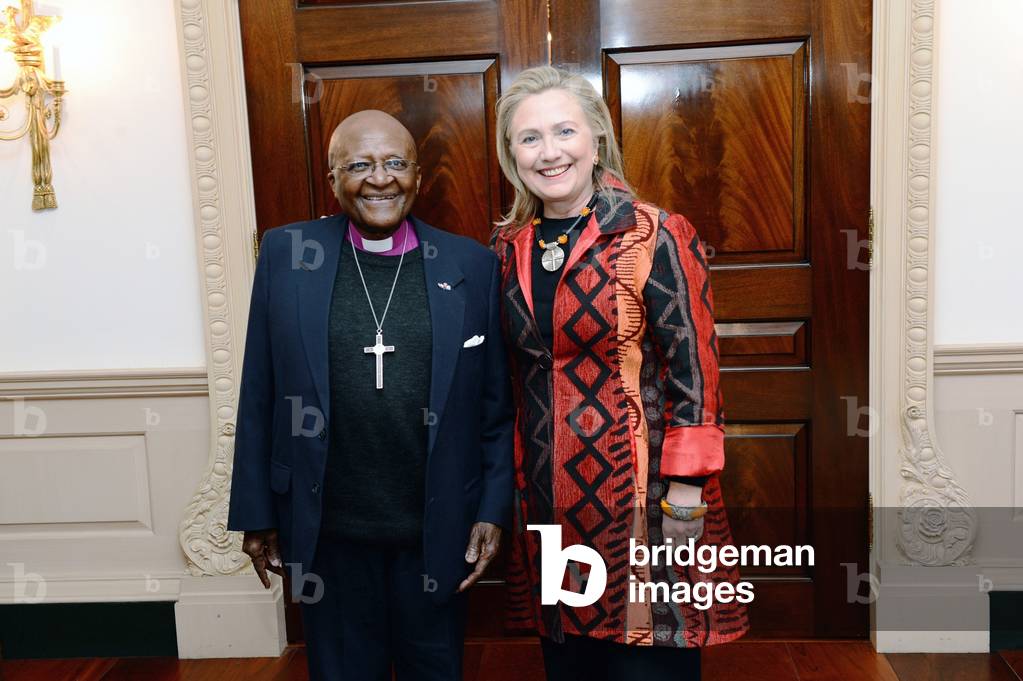 Secretary of State Hillary Rodham Clinton meets with Archbishop Desmond Tutu. Oct. 10, 2012. Tutu was the first black Archbishop of Cape Town of the Anglican Church of Southern Afric. He received the Nobel Peace Prize in 1984 for his opposition to apartheid