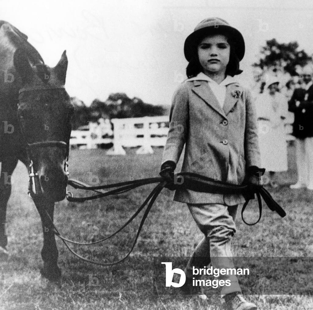 Jacqueline Bouvier age 4, with her pony at a Southampton horse show, c.1933 (b/w photo)