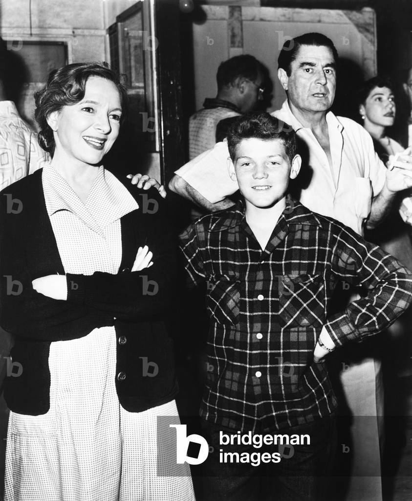 Helen Hayes, America's first actress, shows her son, Jamie MacArthur, around the Paramount set. July 1952. She was filming MY SON JOHN, directed by Leo McCaroy (right). Jamie McArthur became an actor and played Danno Williams on the TV series, 'Hawaii Five-O'