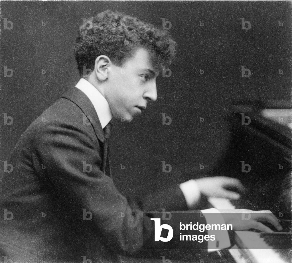 Young Artur Rubinstein (1887-1982), seated at piano 1906, the year the Polish pianist made his American debut at Carnegie Hall