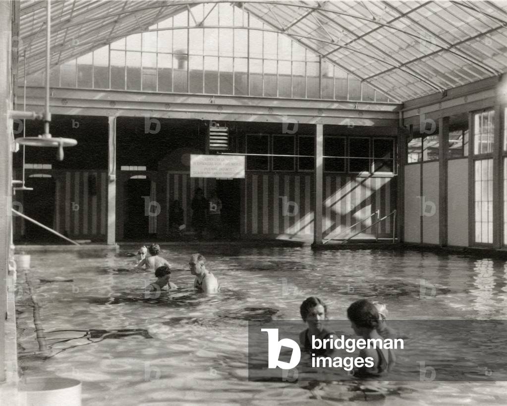 Franklin Roosevelt in physical therapy at Warm Springs indoor pool. 1928. The mineral springs flowed at nearly 32 °C (90 °F)