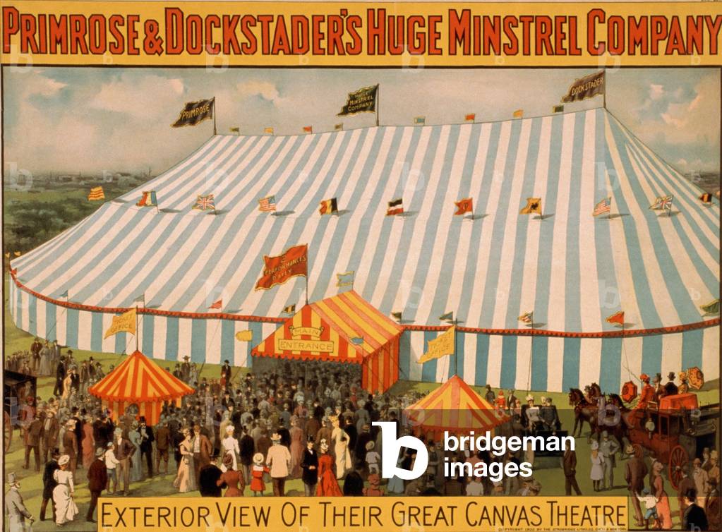 Canvas tent of the Primrose & Dockstader's HUGE MINSTREL COMPANY's touring show. At the turn of the century minstrel shows offered many variety acts with spectacular staging. 1900