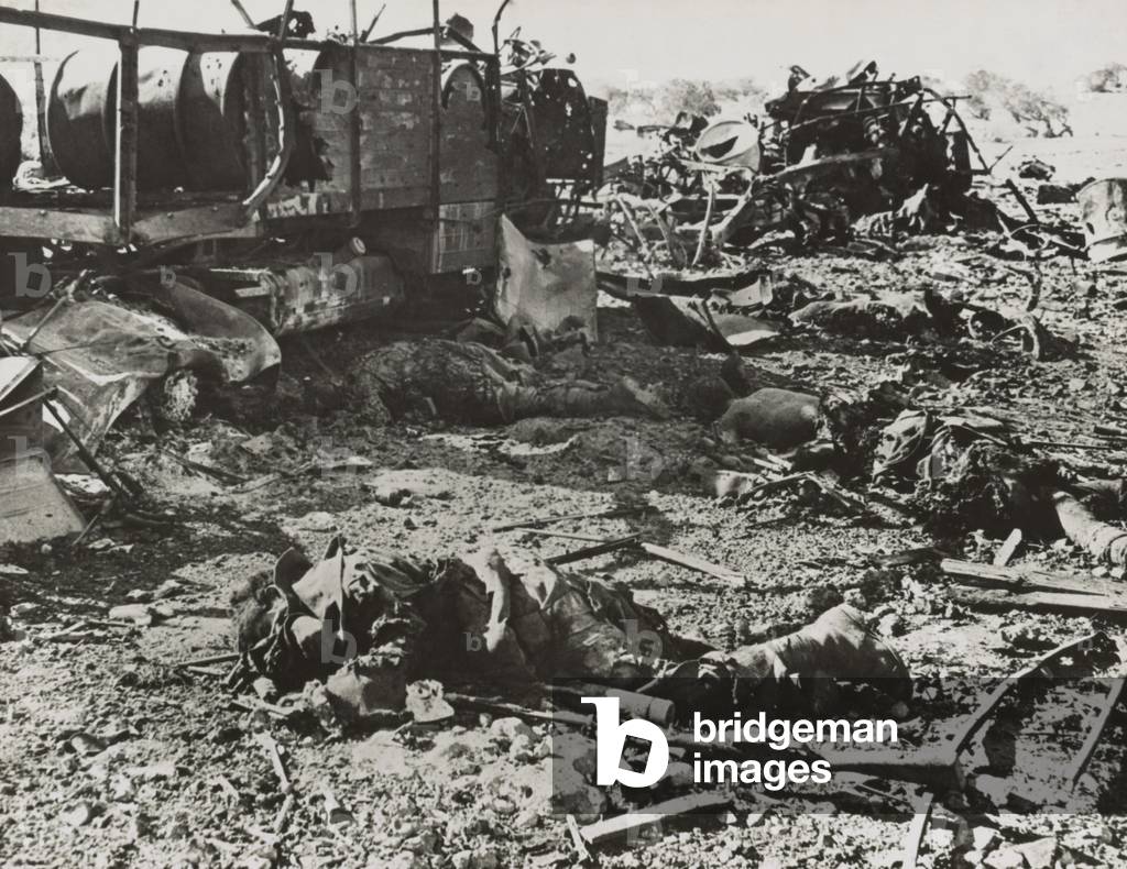 Dead Italian troops were transporting ammunition when struck by British artillery. Near Derna, Cyrenaica, during World War 2, c. 1940-42