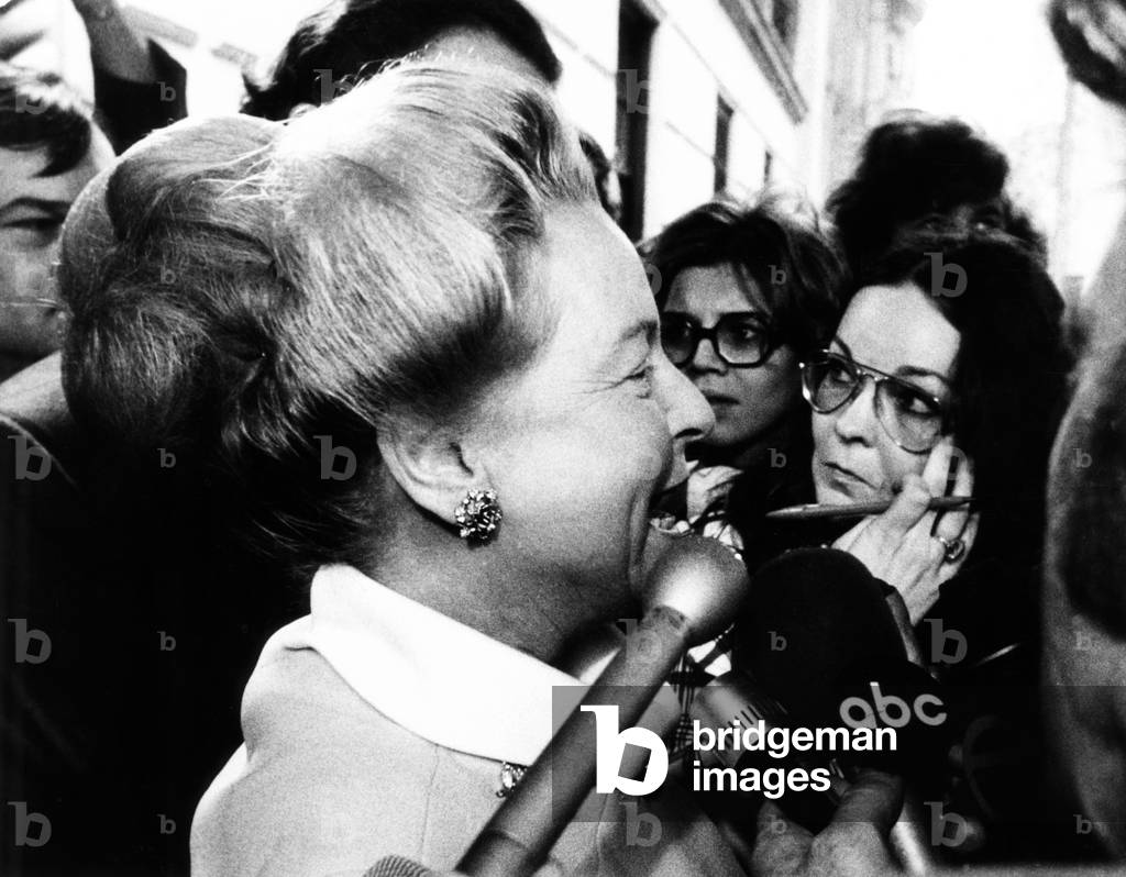 Martha Mitchell talks to the press outside her New York apartment on May 3, 1973. She said her husband, former Atty. Gen. John Mitchell, assured her that he was not involved in wrongdoing in the Watergate case. She indiscreetly added, 'I trust and pray to God that he was not.' Mitchell was indicted and convicted for Watergate cover-up
