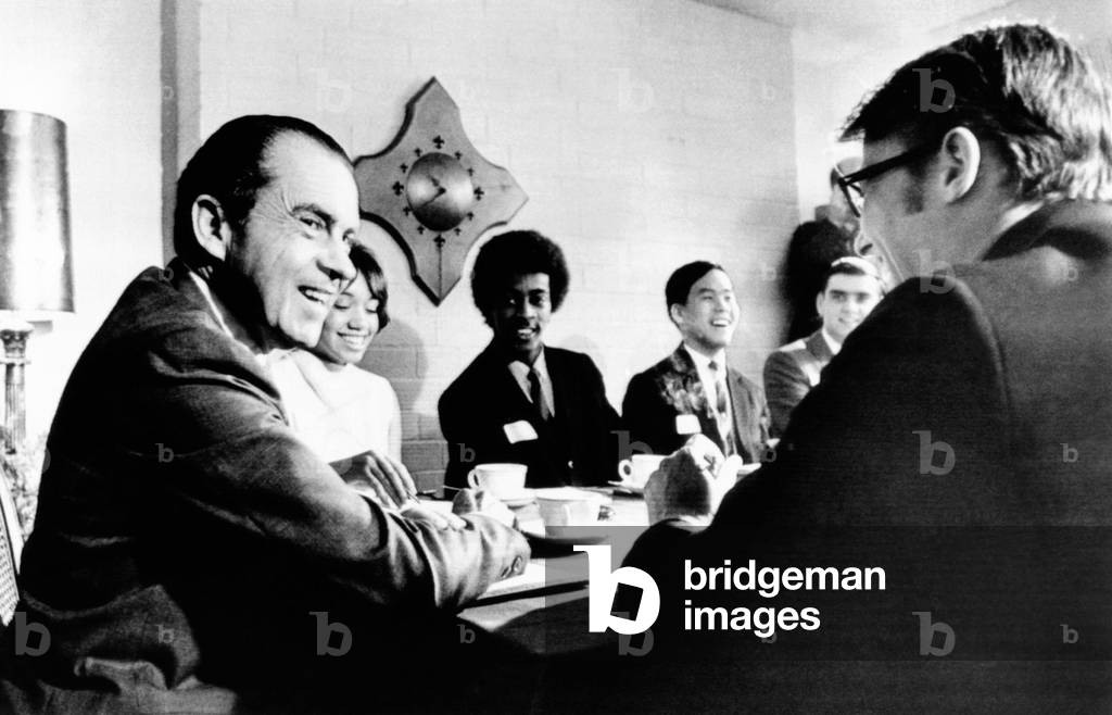 President Richard Nixon meets young people who have served on experimental youth advisory committees within the Selective Service System, June 6, 1969