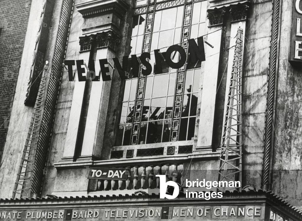 Television was shown for the first time in England, June 1932. The demonstration showed the Epson Derby at the Metropole Cinema. On the theater's marque is 'Baird Television' referring the British television pioneer, John Logie Baird.