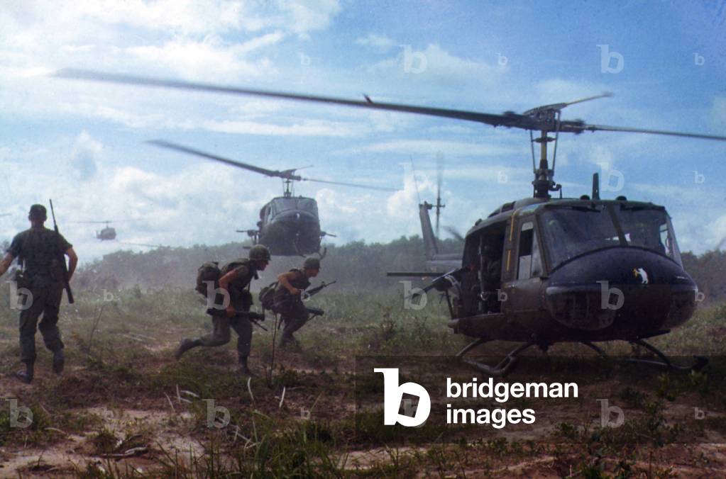 Vietnam War, UH-1D helicopters airlift members of the 2nd Battalion, 14th Infantry Regiment from the Filhol Rubber Plantation area to a new staging area, during Operation 'Wahiawa', a search and destroy mission conducted by the 25th Infantry Division, northeast of Cu Chi, c.late 1960s