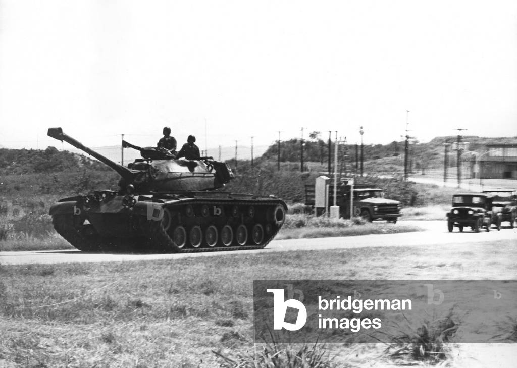 BAY OF PIGS INVASION: U.S. Marines form a caravan from Guantanamo Bay to Leeward Point Hill, Cuba. April 17, 1961