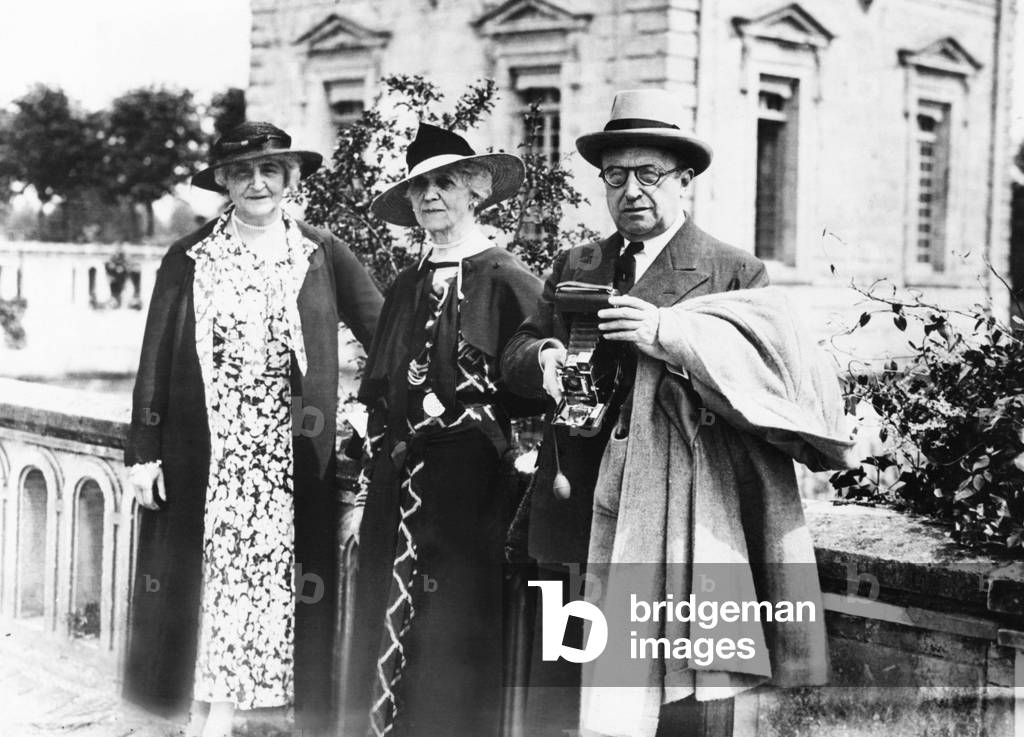 Anne Tracy Morgan and Mrs. W. K. Vanderbilt, a.k.a. Anne Sands Rutherfurd Vanderbilt. At right is former French Premier Andre Tardieu. Both women were from fabulously wealthy American families. In the background is the historic Chateaux of Blerancourt they restored