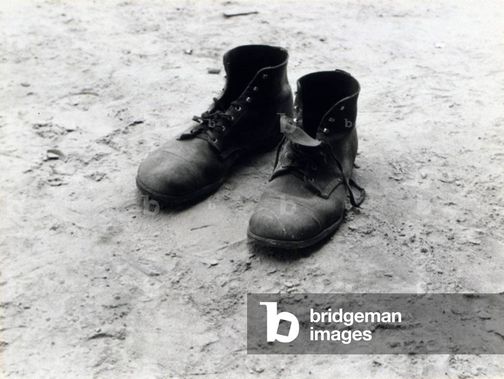 The work boots of Foyd Burroughs, cotton sharecropper, Hale County, Alabama. Published in the book,