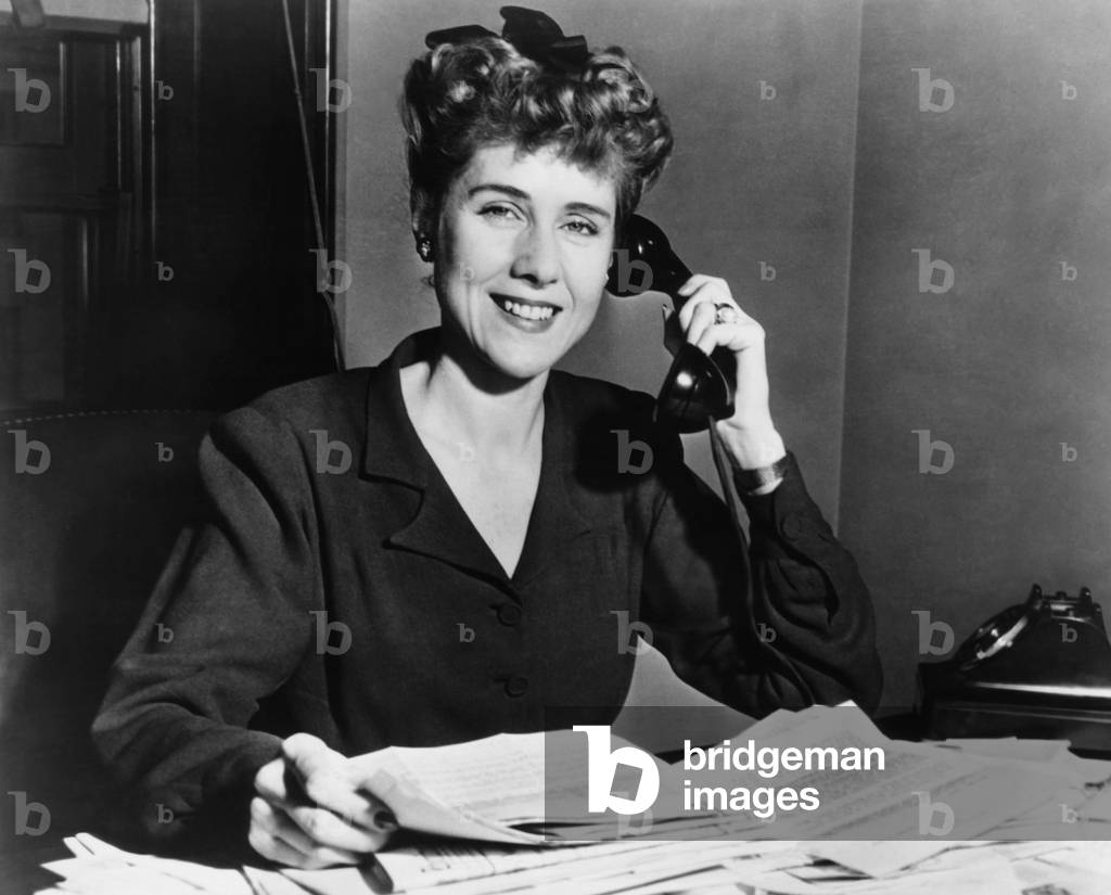 Clare Booth Luce at desk, c. 1947. She did not seek re-election to Congress in 1946 but remained politically active and moved further right within the Republican Party