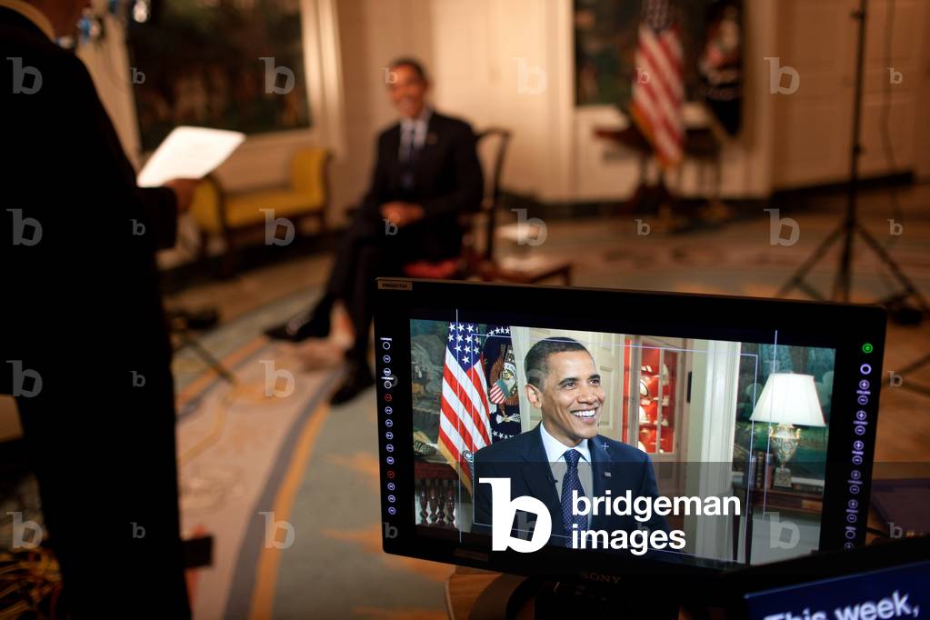 President Barack Obama tapes the weekly address in the Diplomatic Room of the White House May 29 2009.,