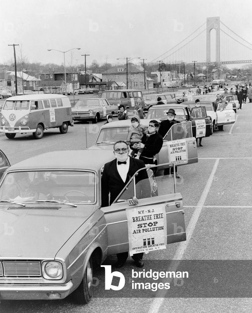 Protesters of 'Operation Breath Free' wear surgical masks as they enter their cars at South Beach, Staten Island. 1967