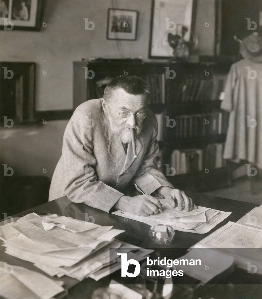 Charles P. Steinmetz (1865-1923), German-American mathematician and electrical engineer at his desk at the General Electric Company c. 1910. His work contributed to the adoption of alternating electric current as the transmission standard for the 20th century electricity. Ca, 1910