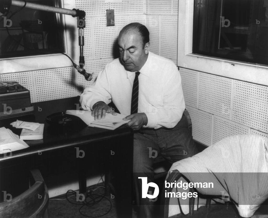 Pablo Neruda (1904-1973), Chilean poet, awarded the Nobel Prize for Literature in 1971. Photo shows Neruda in the Library of Congress recording studio. c. 1950s