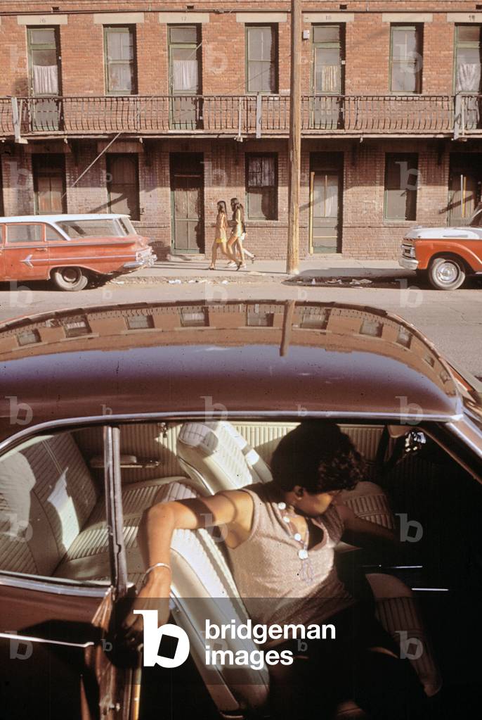 1970s Americ. A chicano teenager in the barrio area of El Paso, Texas c. 1973
