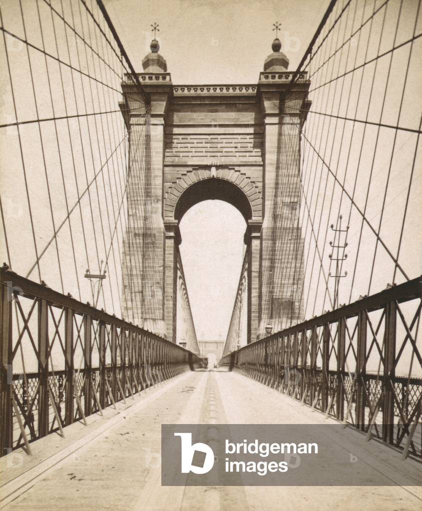 Suspension Bridge spanning the Ohio River at Cincinnati was engineered and built by John A. Roebling. Opened in 1866 it was then the World's longest bridge. LC-DIG-ppmsca-08780_CROP