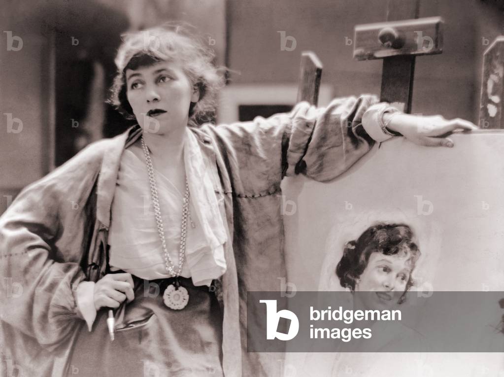 Neysa McMein (1888-1949), in her New York studio, c. 1920. She was a very successful portrait and commercial artist and member of the Algonquin Round Table. Among her many accomplishments was the creation of the first image of General Mills's fictional housewife, BETTY CROCKER