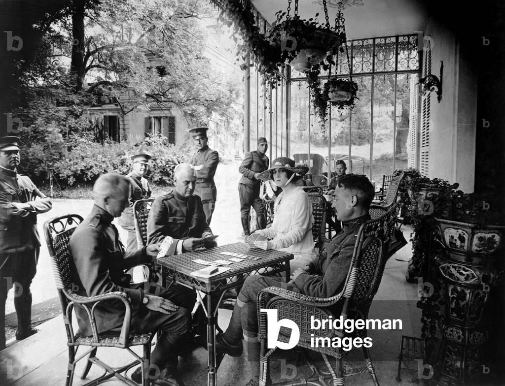Wounded American officers playing bridge with Mrs. William Ellis Corey, then the wife of the American steel magnate. The former actress, Mabelle Gilman, established a canteen for officers at her Chateau de Villegnis in the Valley of Chavreate during World War I. Sept. 18, 1918
