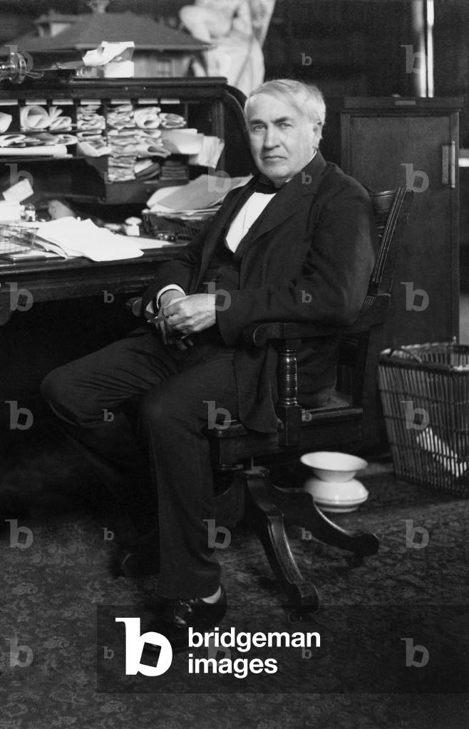 Thomas A. Edison (1847-1931) at his desk in his West Orange, New Jersey, laboratory, c. 1913