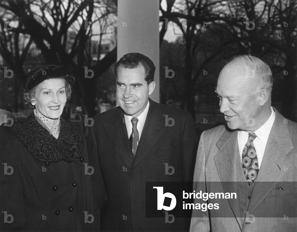 President Dwight Eisenhower with Richard and Pat Nixon after their return from East Asia. Dec. 14, 1953. The six week trip took the Nixon' to 12 Nations: Iran, Afghanistan, Pakistan, India, Ceylon, Thailand, Malaya, Vietnam, Indonesia, Republic of China, Japan and Australia.