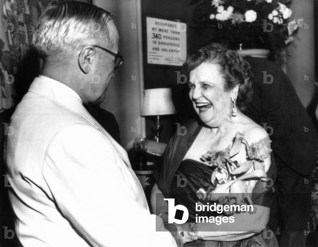 Pearl Mesta political hostess gave a party in Chicago during the Democratic Convention. Aug. 14, 1956. Pearl Mesta laughs heartily when former President Truman, who appointed her Ambassador to Luxembourg, asked for her name. She was portrayed by Ethel Merman in the 1950 Irving Berlin Broadway musical comedy and the 1953 film, CALL ME MADAME
