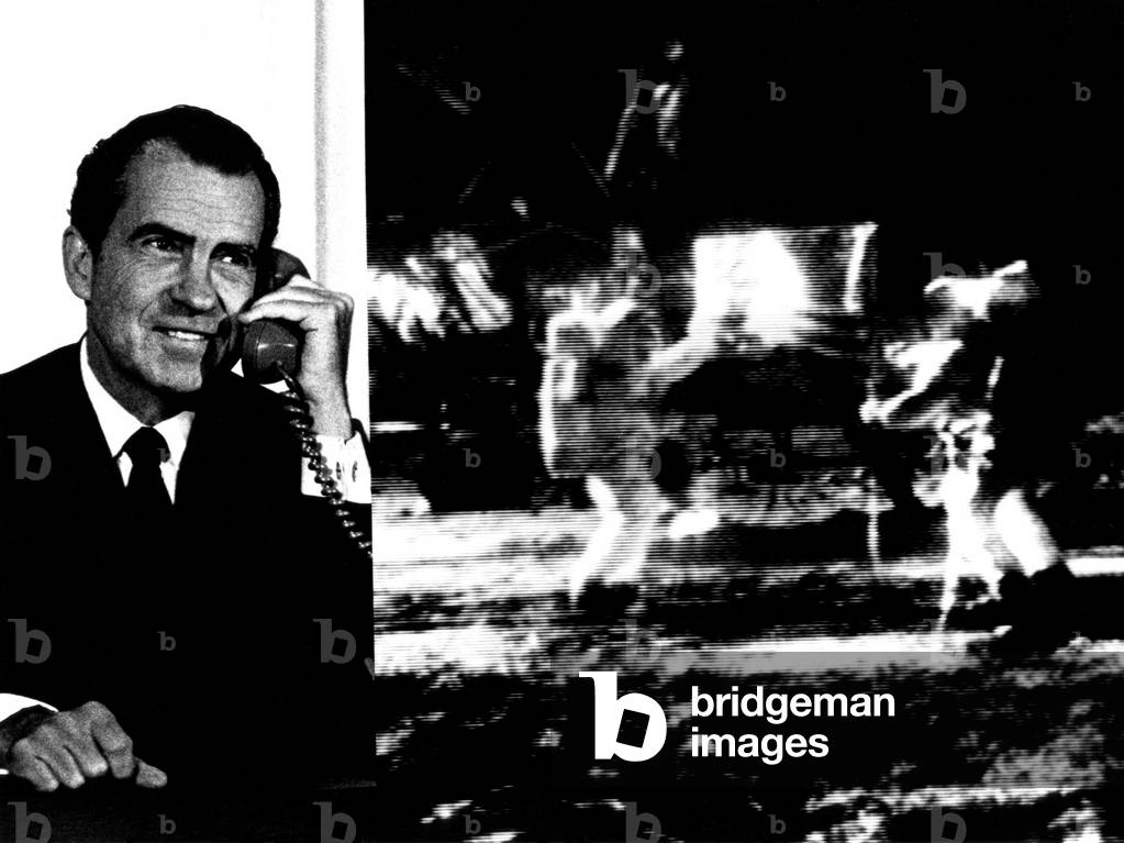 Nixon Telephones Neil Armstrong on the Moon. Composite image of President Nixon and crude televised image of Apollo 11 astronauts Armstrong and Aldrin at Tranquility Base. July 20, 1969. July 20, 1969