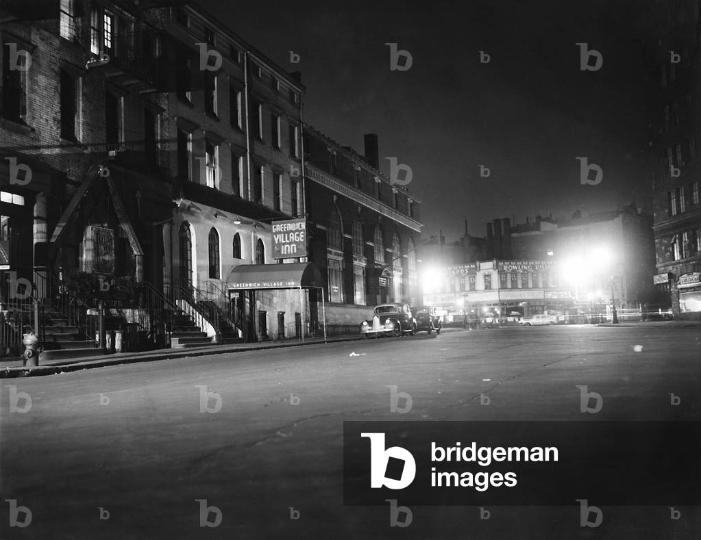 New York City, view of Sheridan Square & the Greenwich Village Inn, during a curfew due to a fuel shortage brought on by a tugboat strike, February 11, 1945
