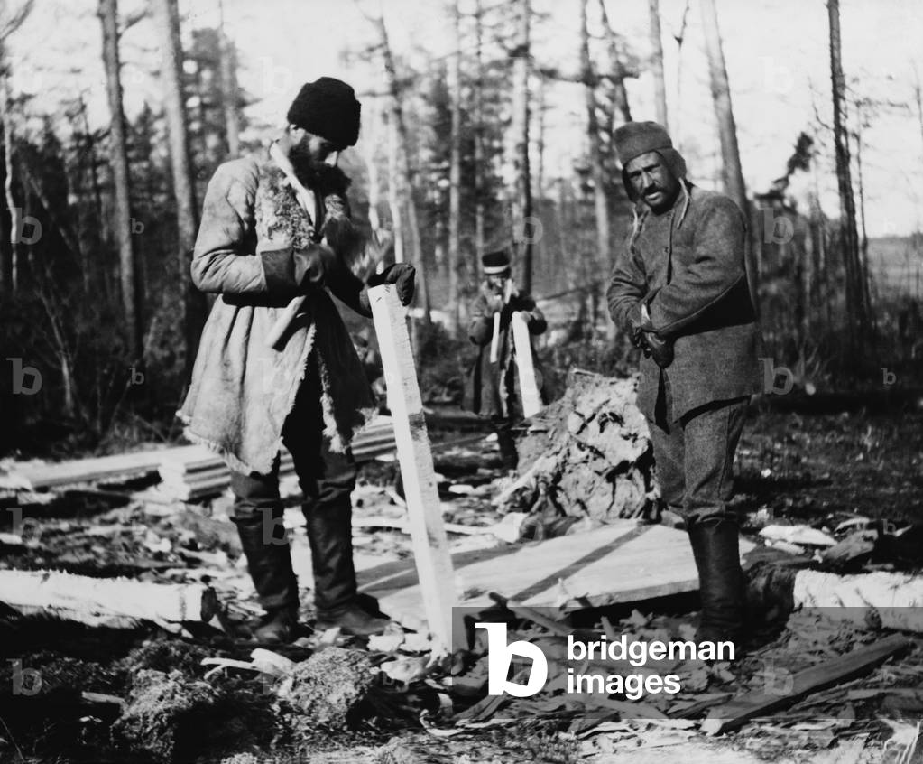 Three Russian convicts building a camp near the Eastern Siberian Railroad. Throughout the 19th century, Russia populated its easternmost territories with political and criminal prisoners. c. 1895 photo by William Henry Jackson